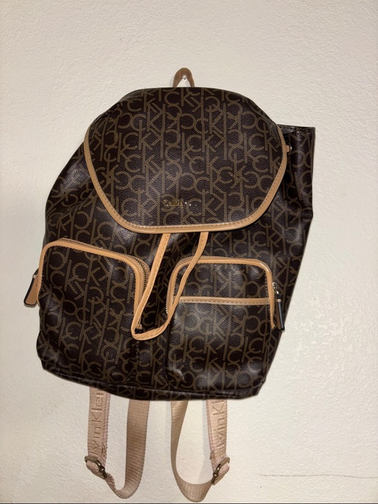 Calvin Klein Handbags - Calvin Klein Brown Monogram Backpack with Tan Trim missing Klein logo